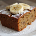 Delicious slice of banana bread made with substitutions, inspired by Chrissy Teigen's recipe.