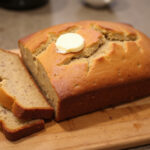 Perfectly baked Chrissy Teigen Banana Bread, sliced and ready to eat.