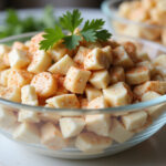 Delicious and fresh imitation crab salad served in a bowl.