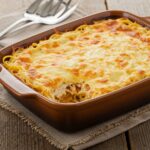Delicious baked cream cheese spaghetti casserole, presenting a mouthwatering dish perfect for family dinners.