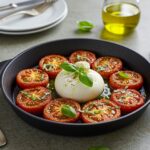 Final dish of roasted tomatoes with burrata cheese, elegantly presented, perfect for showcasing the best roasted tomatoes with burrata recipe.