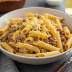 Delicious creamy cheesy penne with garlic butter ground beef, an irresistible meal for pasta lovers.