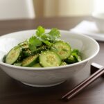 Final presentation of Easy Asian Cucumber Salad, showcasing fresh, vibrant ingredients in a decorative bowl, ideal for a healthy meal.