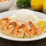Beautifully presented easy creamy garlic shrimp on a plate, ready to delight with every bite.