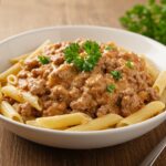 Delicious Easy Stovetop Creamy Ground Beef Pasta served in a bowl, highlighting the creamy sauce and savory ground beef.