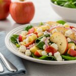 Delicious Honeycrisp apple and feta salad beautifully arranged, showcasing fresh ingredients and ideal for a healthy lifestyle.
