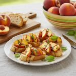 Final presentation of best peach bruschetta with whipped ricotta, featuring a rustic table setting that enhances the dish's appeal.