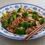 Delicious plate of Chinese Beef and Broccoli, showcasing vibrant colors and textures, perfect for a savory meal.