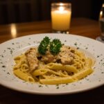 A perfectly plated Cowboy Butter Chicken Pasta ready to serve, highlighting the vibrant colors and textures of the dish in an inviting dining scene.