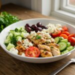 Final presentation of Easy Healthy Greek Chicken Bowls, showcasing healthy ingredients in a delicious arrangement.