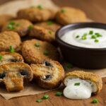 gourmet presentation of fried sliced mushrooms with ranch dressing on a rustic table, perfect for serving
