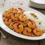 Final presentation of Honey Walnut Shrimp, beautifully plated and garnished, perfect for showcasing this delightful dish.