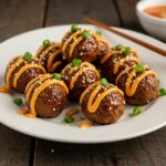 Final presentation of Korean BBQ Meatballs with Spicy Mayo Dip, artfully arranged and garnished, ready to serve and enjoy.