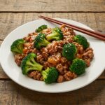 Deliciously plated Quick & Easy Honey Garlic Ground Beef and Broccoli Stir-Fry garnished with sesame seeds, showcasing a vibrant meal.