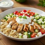 Refreshing chicken tzatziki bowl with fresh ingredients, ideal for a healthy light lunch.