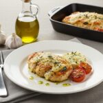 Final presentation of savory Blackstone garlic parmesan chicken delight with vibrant colors and textures, perfect for a comforting meal.