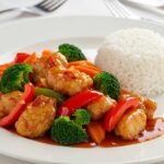 Delicious and visually appealing Sweet Chili Chicken served elegantly, highlighting the exquisite flavors and colors of this mouthwatering recipe.