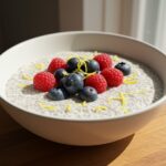 Final presentation of the Best Lemon Cream Chia Pudding, showcasing its creamy texture and vibrant garnishes for a healthy dessert.