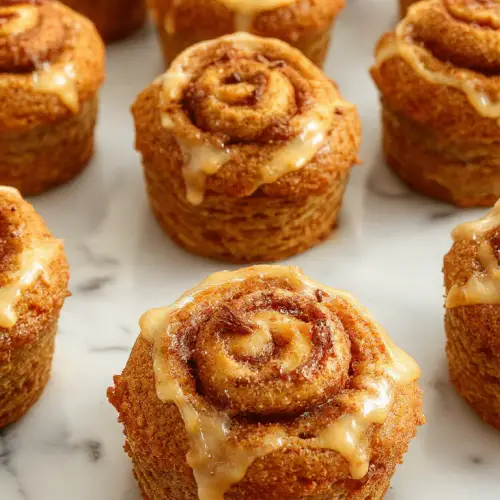 The Best Pumpkin Cinnamon Roll Muffins Ever